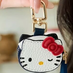 ❤️NEW Winky Hello Kitty Coin Purse with Red Bow❤️